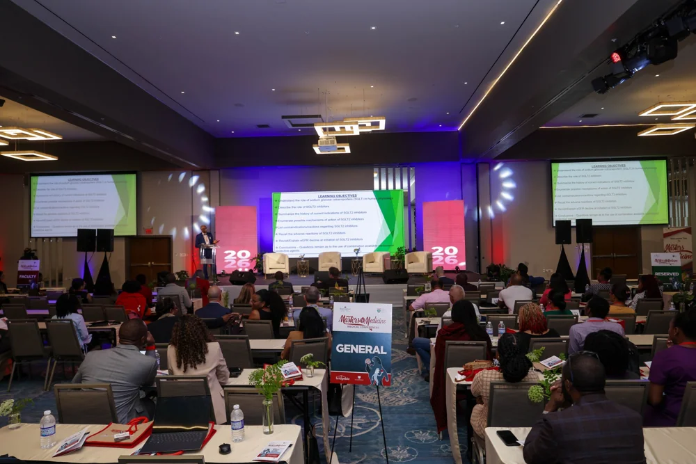 A full conference audience and the scientific stage