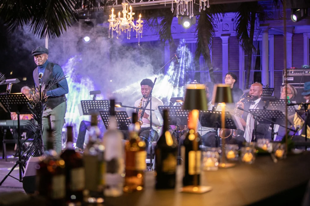 The gala stage, musicians and illuminated tables