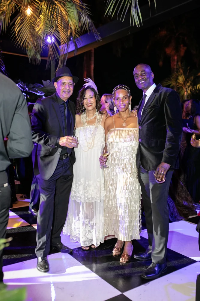 Three guests photographed at the gala