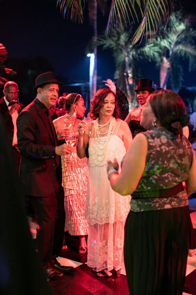 Guests talking in the illuminated gala garden