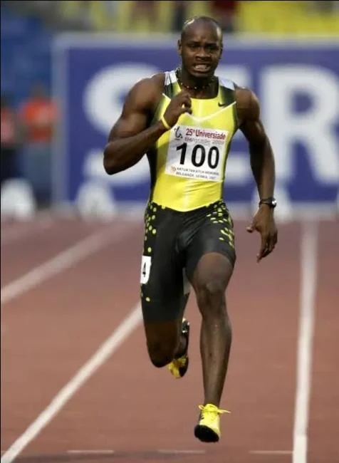Asafa Powell competing on the track
